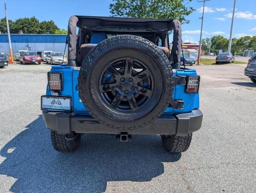 Blue 2014 Jeep Wrangler Sahara