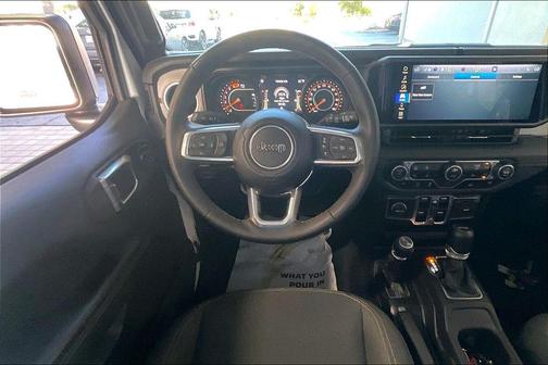 Bright White Clearcoat 2025 Jeep Wrangler 4-Door Sahara 4x4