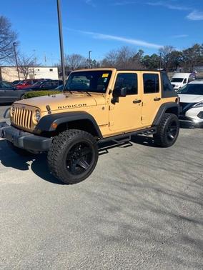 Photo 3 of 5 of 2014 Jeep Wrangler Unlimited Rubicon