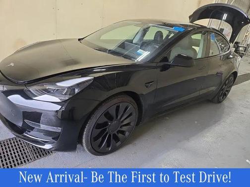 Solid Black 2023 Tesla Model 3 Performance