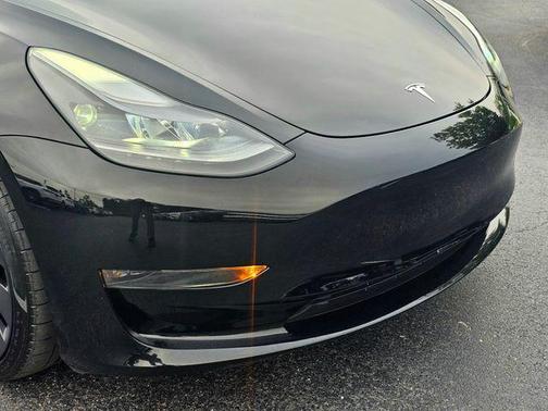 Solid Black 2023 Tesla Model 3 Performance