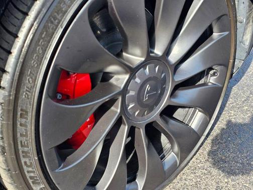 Solid Black 2024 Tesla Model Y Performance Dual Motor All-Wheel Drive