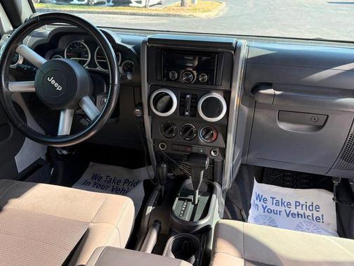 Silver 2010 Jeep Wrangler Unlimited Sahara