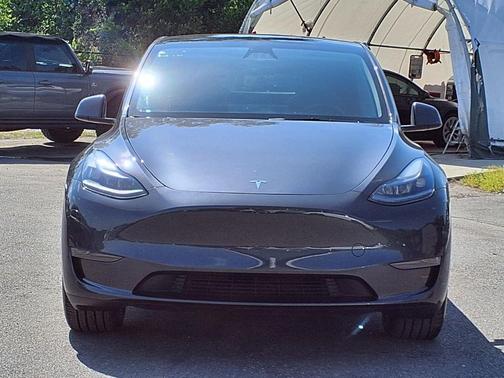 Solid Black 2025 Tesla Model Y Long Range Dual Motor Rear-Wheel Drive