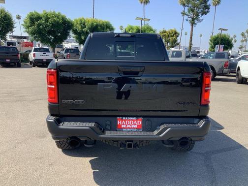 Diamond Black Crystal Pearlcoat 2026 RAM 1500 RHO Crew Cab 4x4 5'7' Box