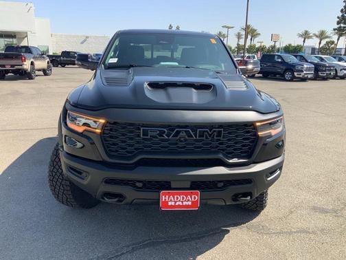 Diamond Black Crystal Pearlcoat 2026 RAM 1500 RHO Crew Cab 4x4 5'7' Box
