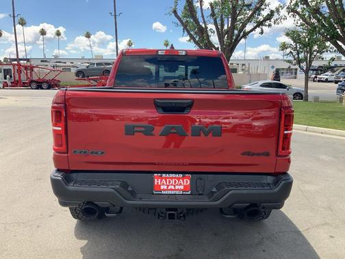 Molten Red 2026 RAM 1500 RHO Crew Cab 4x4 5'7' Box