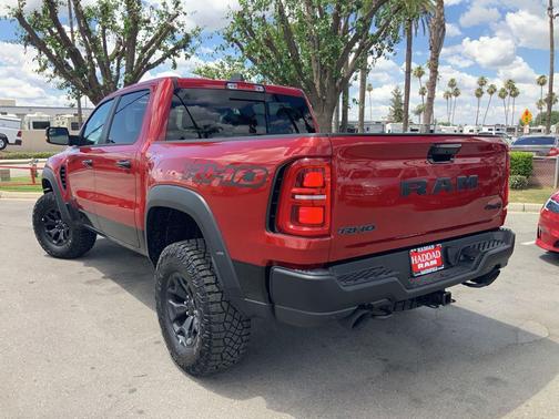 Molten Red 2026 RAM 1500 RHO Crew Cab 4x4 5'7' Box