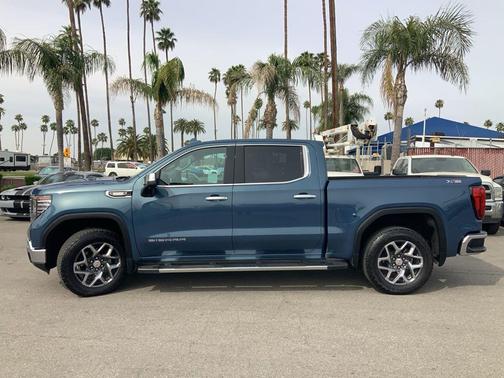 Downpour Metallic 2024 GMC Sierra 1500 SLT
