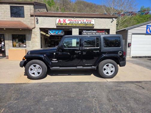 Black Clearcoat 2011 Jeep Wrangler Unlimited Sahara