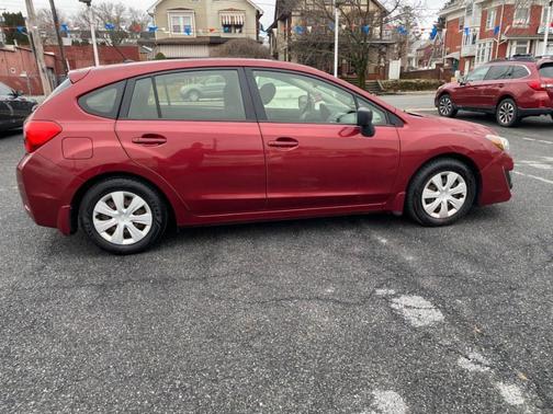 Red 2016 Subaru Impreza 2.0i