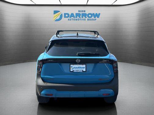 Arctic Ice Blue Metallic/Super Black 2026 Nissan Kicks SR