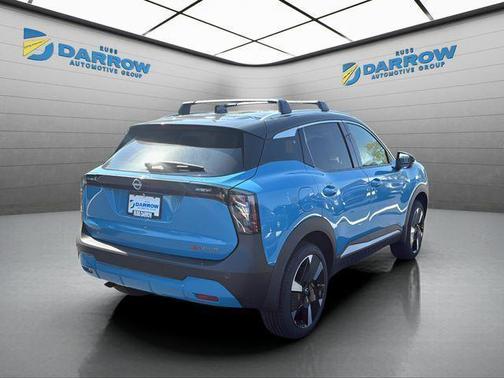 Arctic Ice Blue Metallic/Super Black 2026 Nissan Kicks SR