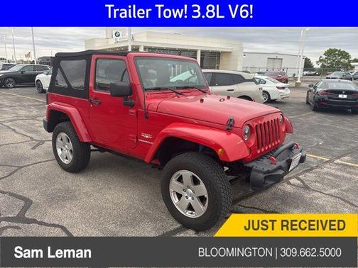 Red 2011 Jeep Wrangler Sahara