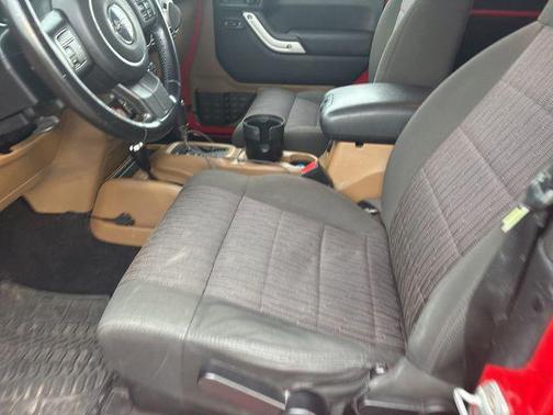 Red 2011 Jeep Wrangler Sahara