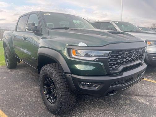 Serrano Green Metallic 2026 RAM 1500 RHO Crew Cab 4x4 5'7' Box