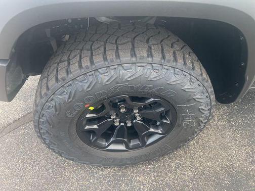 Serrano Green Metallic 2026 RAM 1500 RHO Crew Cab 4x4 5'7' Box