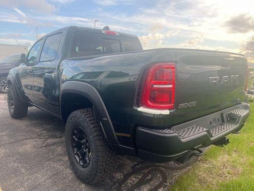 Serrano Green Metallic 2026 RAM 1500 RHO Crew Cab 4x4 5'7' Box