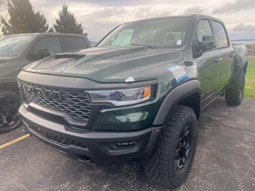 Serrano Green Metallic 2026 RAM 1500 RHO Crew Cab 4x4 5'7' Box