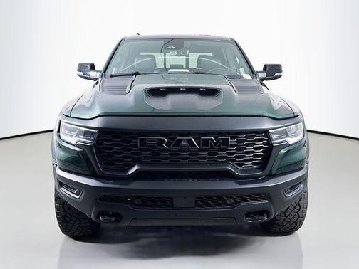 Serrano Green Metallic 2026 RAM 1500 RHO Crew Cab 4x4 5'7' Box