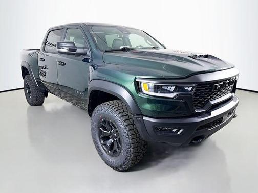 Serrano Green Metallic 2026 RAM 1500 RHO Crew Cab 4x4 5'7' Box
