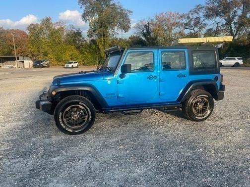 Photo 5 of 23 of 2016 Jeep Wrangler Unlimited Sport