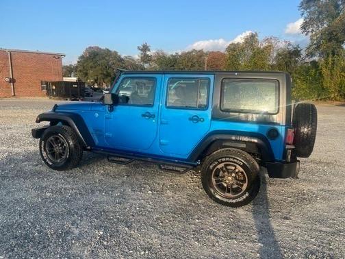 Photo 4 of 23 of 2016 Jeep Wrangler Unlimited Sport