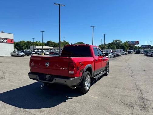Red 2012 RAM 1500 SLT