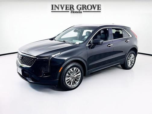 Stellar Black Metallic 2024 Cadillac XT4 Premium Luxury