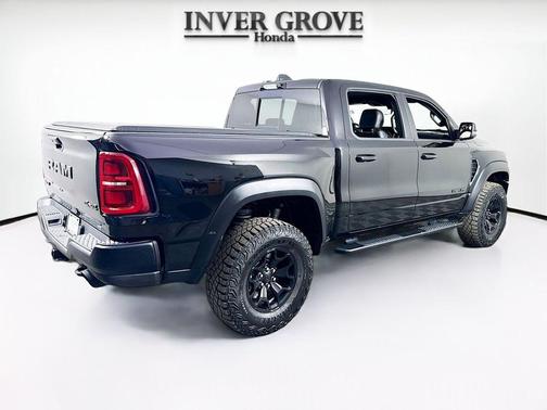 Diamond Black Crystal Pearlcoat 2025 RAM 1500 RHO Crew Cab 4x4 5'7' Box