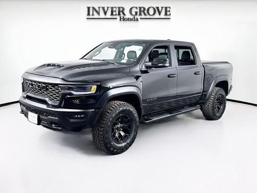 Diamond Black Crystal Pearlcoat 2025 RAM 1500 RHO Crew Cab 4x4 5'7' Box