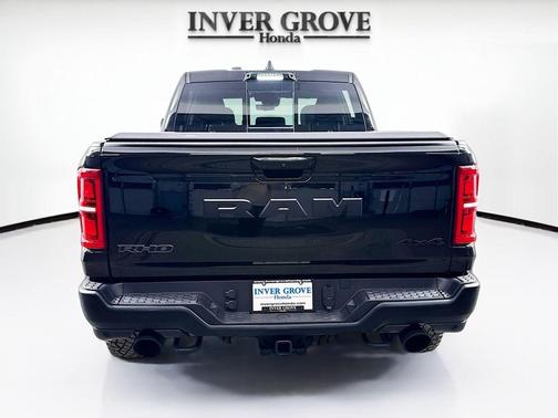 Diamond Black Crystal Pearlcoat 2025 RAM 1500 RHO Crew Cab 4x4 5'7' Box