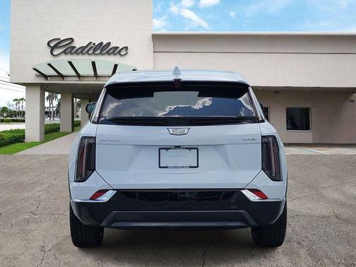 Vibrant White Tricoat 2026 Cadillac OPTIQ Luxury