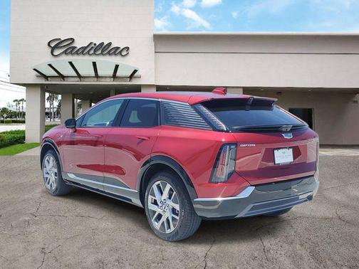 Radiant Red Tintcoat 2026 Cadillac OPTIQ Luxury