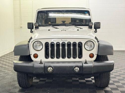 Stone White Clearcoat 2010 Jeep Wrangler Unlimited Sport