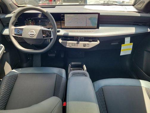 Everest White Pearl Tricoat/Black 2026 Nissan Leaf PLATINUM+