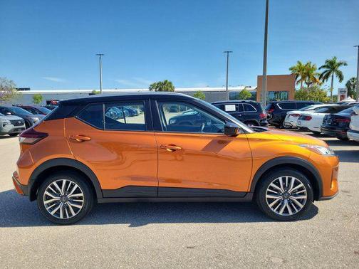 Monarch Orange Metallic/Super Black 2024 Nissan Kicks SV