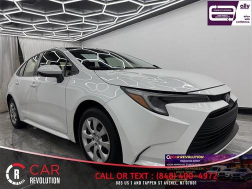 White 2023 Toyota Corolla Hybrid LE