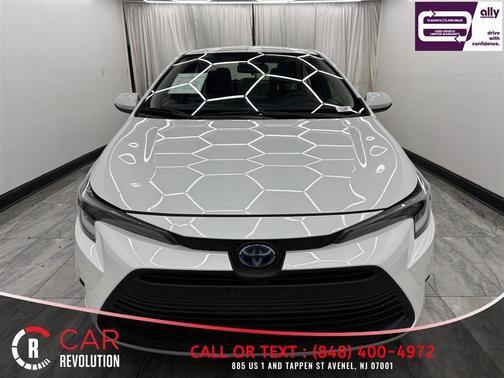 White 2023 Toyota Corolla Hybrid LE