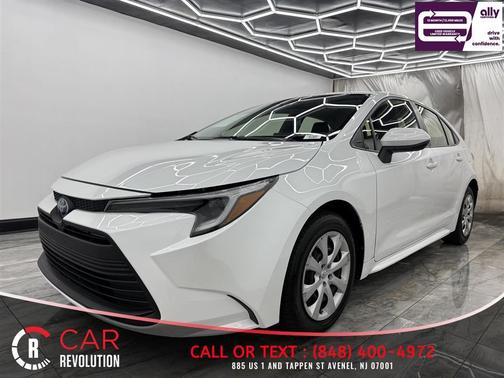 White 2023 Toyota Corolla Hybrid LE