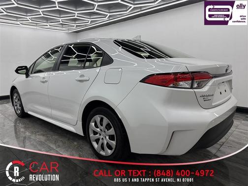 White 2023 Toyota Corolla Hybrid LE