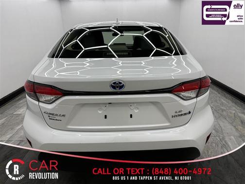 White 2023 Toyota Corolla Hybrid LE