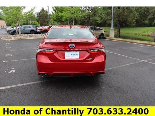 Supersonic Red 2021 Toyota Camry Hybrid SE