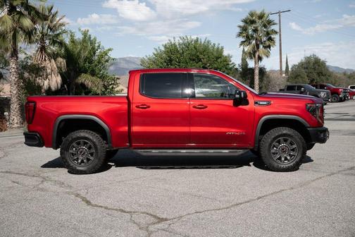 Volcanic Red 2026 GMC Sierra 1500 AT4X