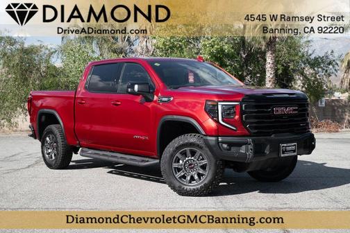 Volcanic Red 2026 GMC Sierra 1500 AT4X