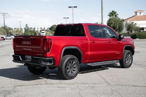 Volcanic Red 2026 GMC Sierra 1500 AT4X