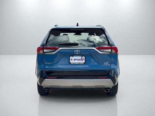 Cavalry Blue/Midnight Black Metallic 2023 Toyota RAV4 Hybrid SE