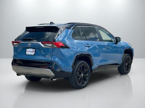 Cavalry Blue/Midnight Black Metallic 2023 Toyota RAV4 Hybrid SE