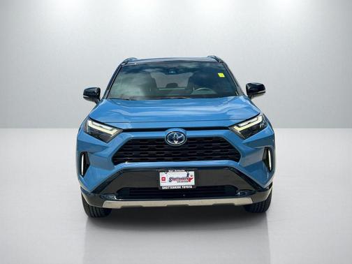 Cavalry Blue/Midnight Black Metallic 2023 Toyota RAV4 Hybrid SE