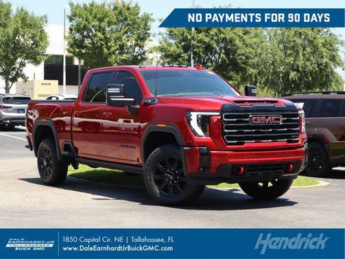 Volcanic Red Tintcoat 2025 GMC Sierra 2500 AT4
